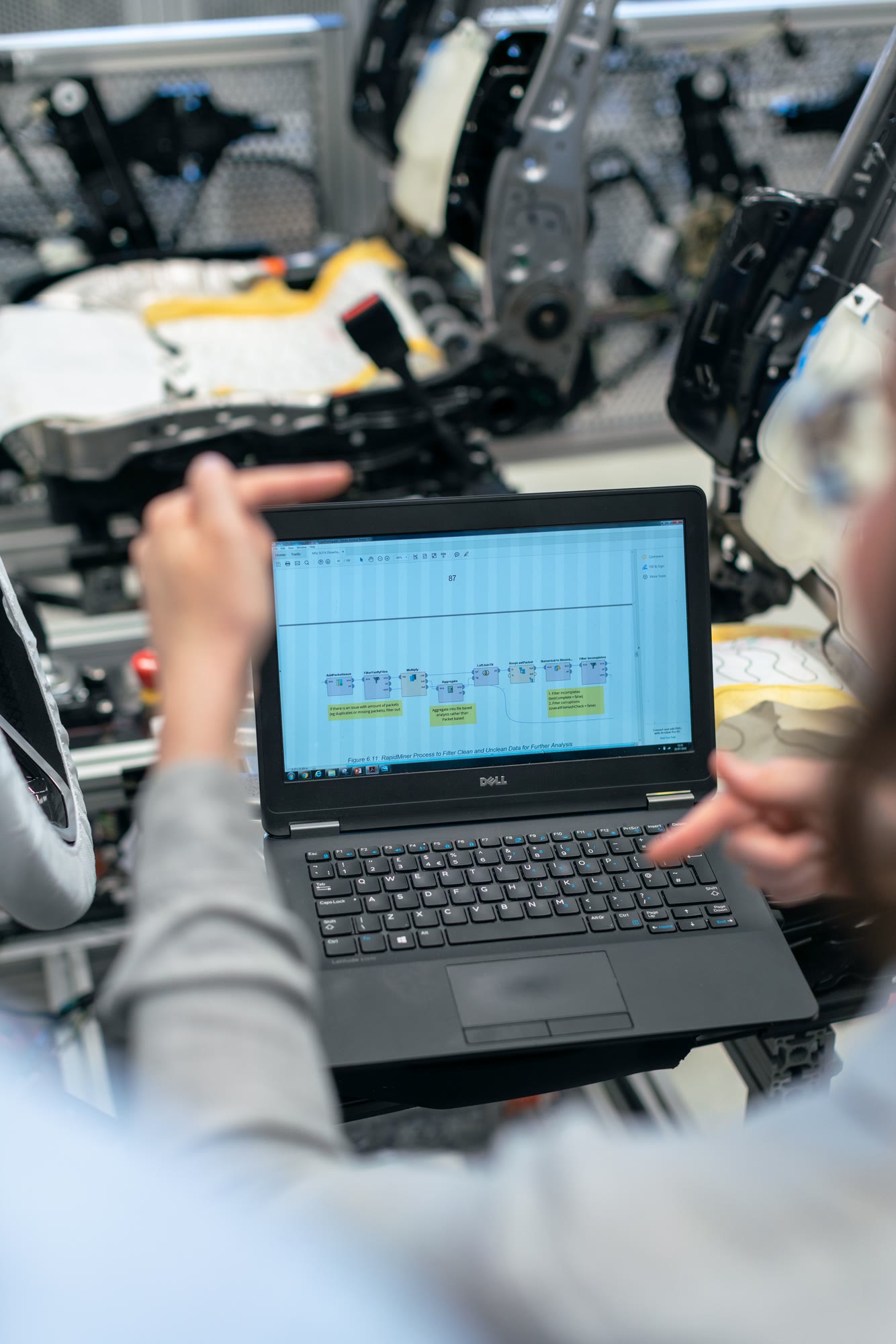 An engineering team working on industry software